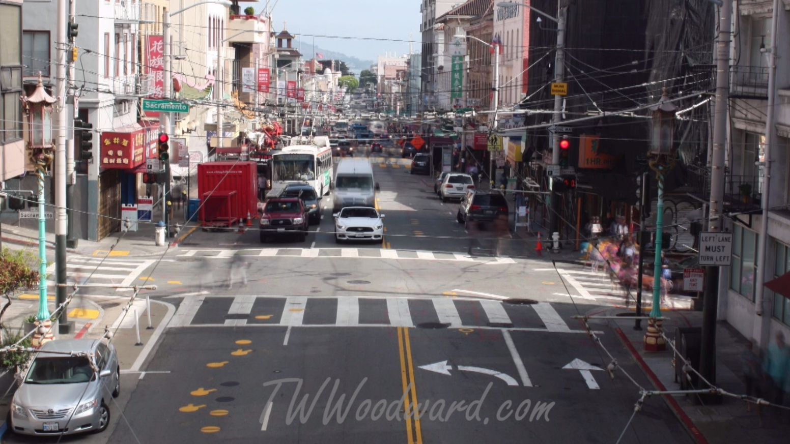Lanterns hanging above a Chinatown street